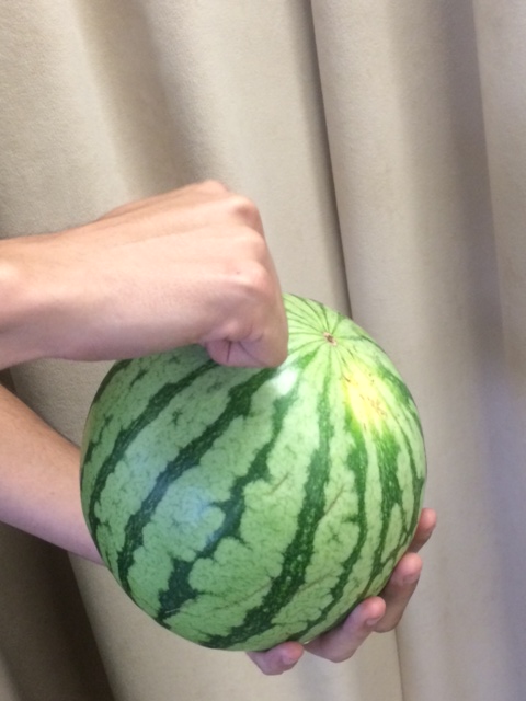 tapping watermelon
